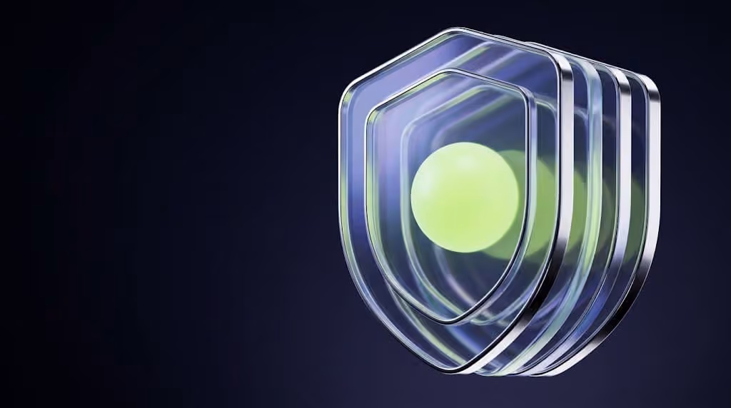 Glass shield of four stacked layers with a glowing green core, symbolizing an AI agent embedded in a cybersecurity platform